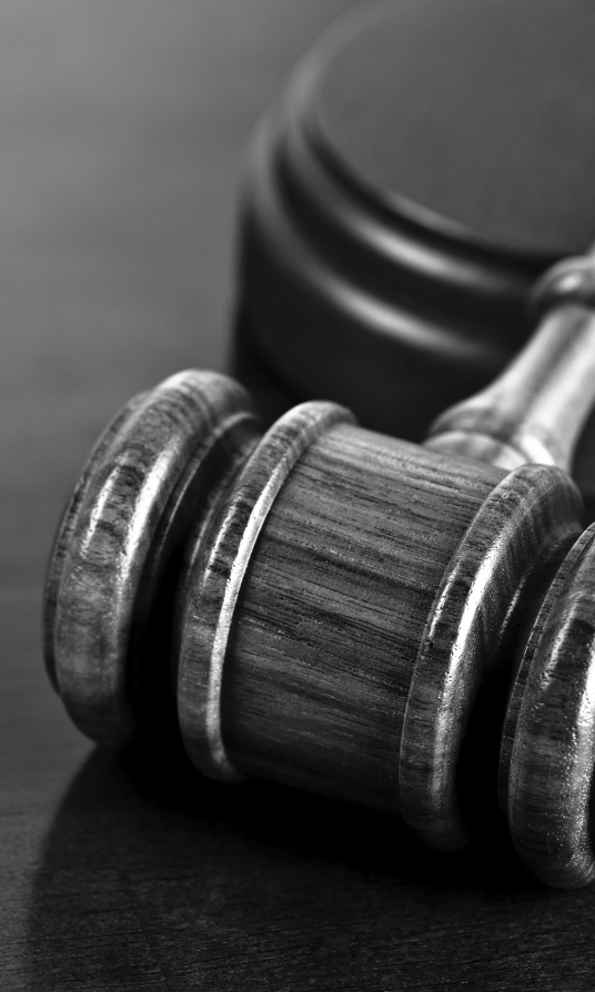 a photo of a gavel on a desk